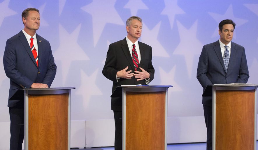 Republican Boise businessman Tommy Ahlquist, from left, Lt. Gov. Brad Little and Rep. Raul Labrador, R-Idaho, participate in a debate at the studios of Idaho Public Television in Boise, Idaho, Monday, April 23, 2018. (AP Photo/Otto Kitsinger)