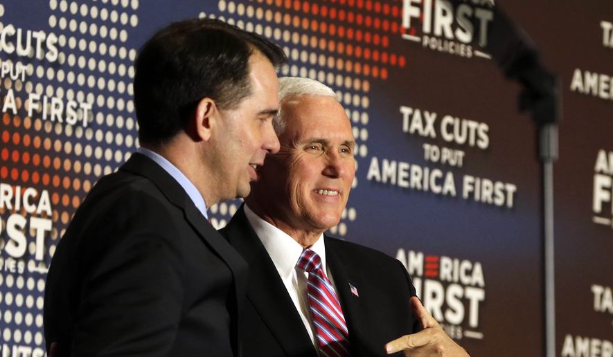 Vice President Mike Pence came to Milwaukee Wednesday, April 25, 2018, to bolster public support for the Republican tax overhaul and raise campaign cash for Gov. Scott Walker. He spoke at an event sponsored by America First Policies, a pro-Donald Trump group. (Rick Wood /Milwaukee Journal-Sentinel via AP)