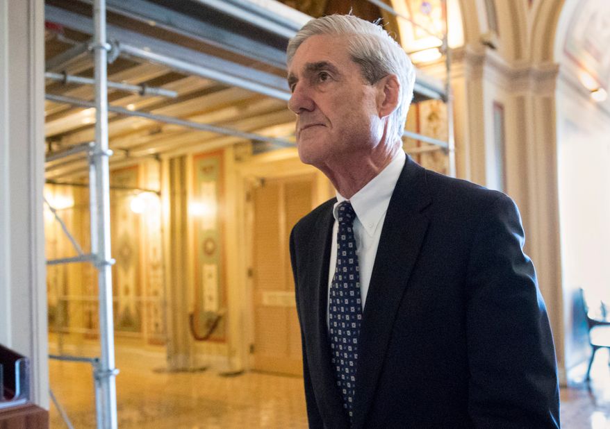 In this June 21, 2017, file photo, special counsel Robert Mueller departs after a meeting on Capitol Hill in Washington. (AP Photo/J. Scott Applewhite, File)