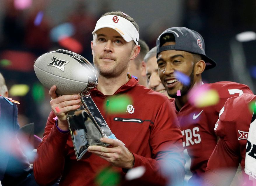 FILE - In this Dec. 2, 2017, file photo, Oklahoma head coach Lincoln Riley holds the Big 12 Conference championship NCAA college football game trophy after Oklahoma defeated TCU, in Arlington, Texas. Riley has already led Oklahoma to the College Football Playoff and another Big 12 title with a Heisman Trophy-winning quarterback. Now Riley has completed his first spring as head coach of the Sooners. “Yeah, we did this one backward kind of ... having been through a whole season, now this is kind of my first spring practice,” Riley said.(AP Photo/Tony Gutierrez, Fil)