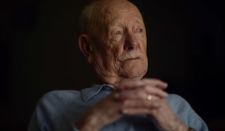 In this April 11, 2018, photo, Armand Sedgeley, 96, poses for a photo in Lakewood, Colo. Even at 96, Sedgeley recalls long-ago events with the clarity of the raw, 22-year-old Army airman he was on the day he fell from the sky over Italy. (Hyoung Chang/The Denver Post via AP)