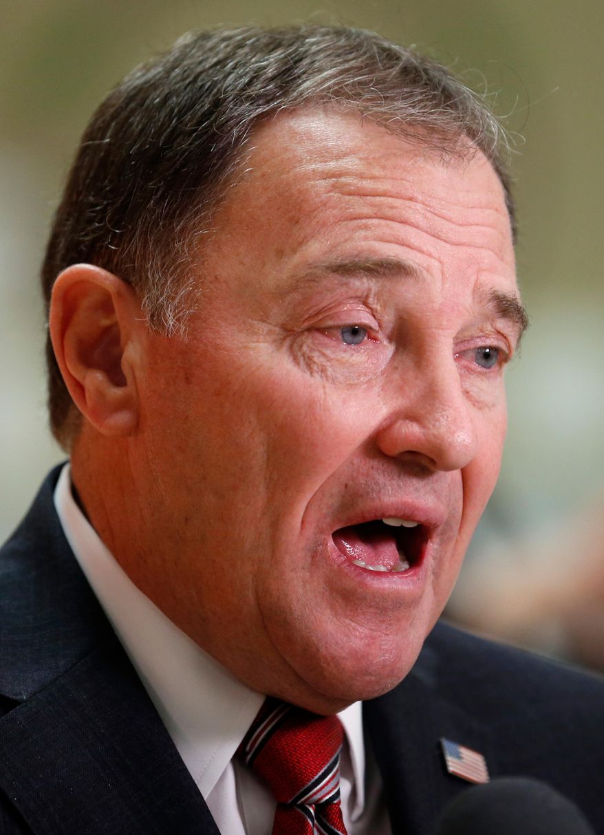 FILE - In this April 16, 2018, file photo, shows Utah Gov. Gary Herbert speaking with reporters following a bill signing ceremony at the Meadowbrook Elementary School, in Bountiful, Utah. Herbert says he will oppose ballot initiatives allowing medical marijuana and expanding Medicaid in his state, but is okay with two other potential measures in November. (AP Photo/Rick Bowmer, File)