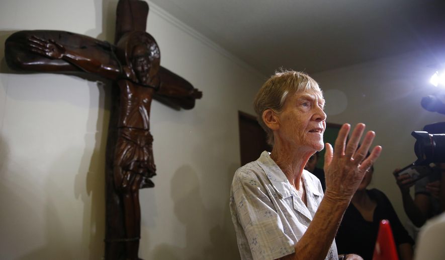 Australian Roman Catholic nun Sister. Patricia Fox is interviewed by the media a day after the Bureau of Immigration forfeited her missionary visa and given 30 days to leave the country Thursday, April 26, 2018 in suburban Quezon city northeast of Manila, Philippines. The Australian nun whose missionary visa in the Philippines was revoked after the president complained about her joining opposition rallies said Thursday that social advocacy and human rights are part of church teachings. (AP Photo/Bullit Marquez)