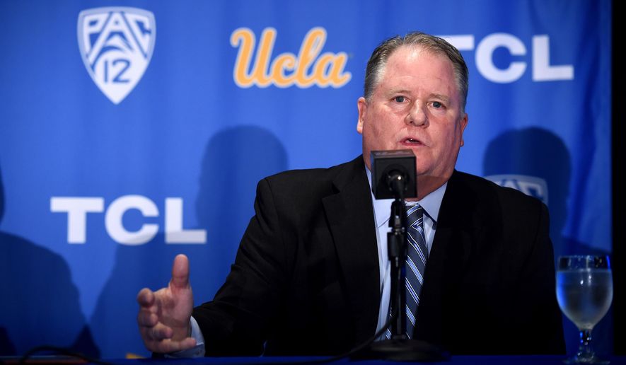 FILE - In this Nov. 27, 2017, file photo, new UCLA head football coach Chip Kelly speaks during a news conference in Los Angeles. The Pac-12 has five new coaches this season, so there was extra importance on spring football this year at UCLA, the two Arizona schools and the two Oregon schools. (Hans Gutknecht/Los Angeles Daily News via AP, File)