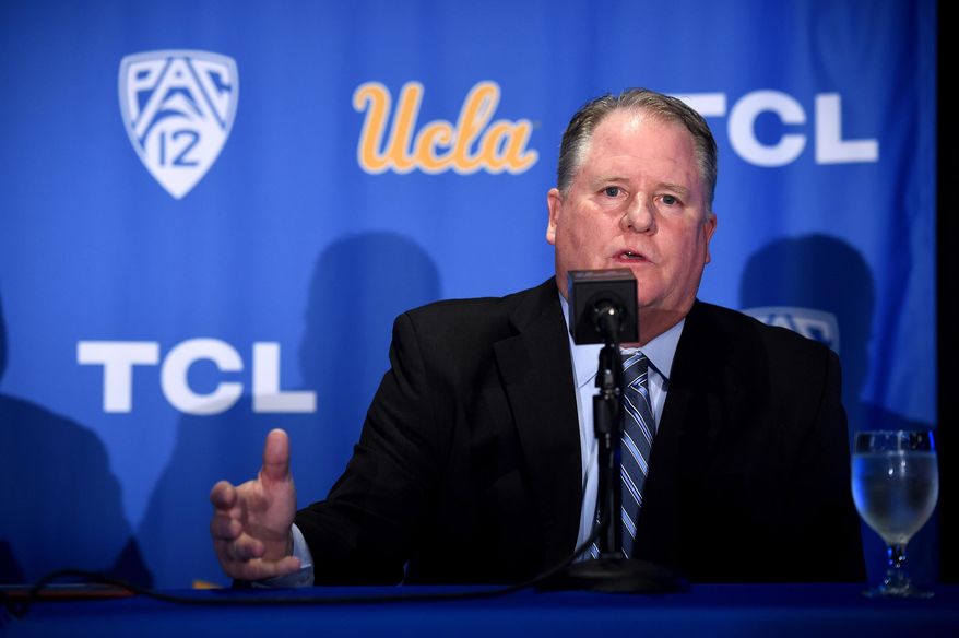 FILE - In this Nov. 27, 2017, file photo, new UCLA head football coach Chip Kelly speaks during a news conference in Los Angeles. The Pac-12 has five new coaches this season, so there was extra importance on spring football this year at UCLA, the two Arizona schools and the two Oregon schools. (Hans Gutknecht/Los Angeles Daily News via AP, File)