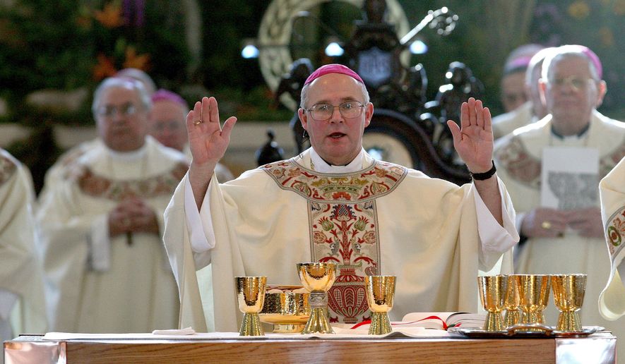 FILE - In this Jan. 16, 2008, file photo, Bishop Michael Warfel, of the Roman Catholic Diocese of Great Falls-Billings, speaks before communion during his installation as the seventh bishop of the diocese at Holy Spirit Catholic Church in Great Falls, Mont. On Friday, April 27, 2018, the diocese and two law firms announced a tentative $20 million settlement with 86 victims of childhood abuse at the hands of clergy. A bankruptcy judge and victims must still approve the settlement. (Casey Page/The Billings Gazette via AP, file)