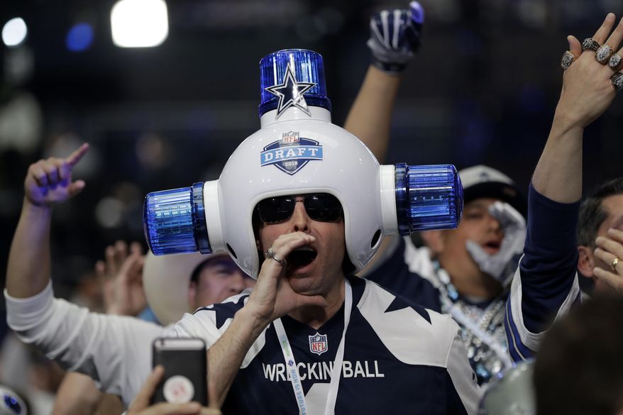 Dallas Cowboys fans cheer during the second round of the NFL football draft Friday, April 27, 2018, in Arlington, Texas. (AP Photo/Eric Gay)