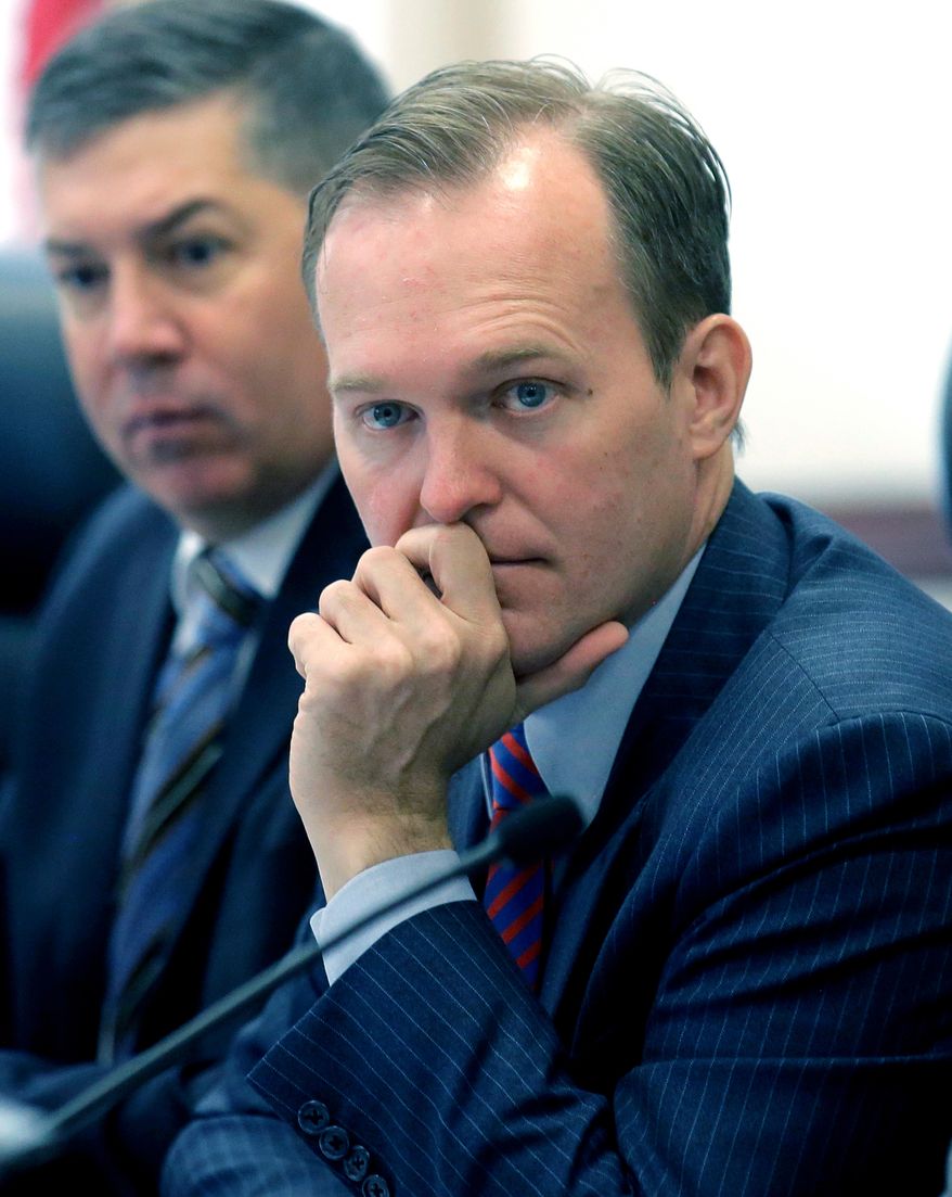 FILE - In this April 10, 2017, file photo, Salt Lake County Mayor Ben McAdams, right, listens during a committee hearing in Salt Lake City. Democrats in deep-red Utah are looking to McAdams to flip one of the state&#39;s four Republican-controlled congressional districts and help take control of the U.S. House. But first he has to win the party&#39;s nomination against four challengers at the party&#39;s state convention Saturday, April 28, 2018. (AP Photo/Rick Bowmer, File)