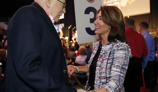 Massachusetts Lt. Governor Karyn Polito greets a delegate during the Massachusetts Republican Convention at the DCU Center in Worcester, Mass., Saturday, April 28, 2018. (AP Photo/Winslow Townson)