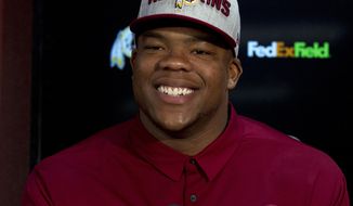 Redskins player Da&#x27;Ron Payne, first round selections of the 2018 NFL Draft speaks at a news conference, during Redskins 2018 Draft Fest, in Landover, Md., Saturday, April 28, 2018. ( AP Photo/Jose Luis Magana)