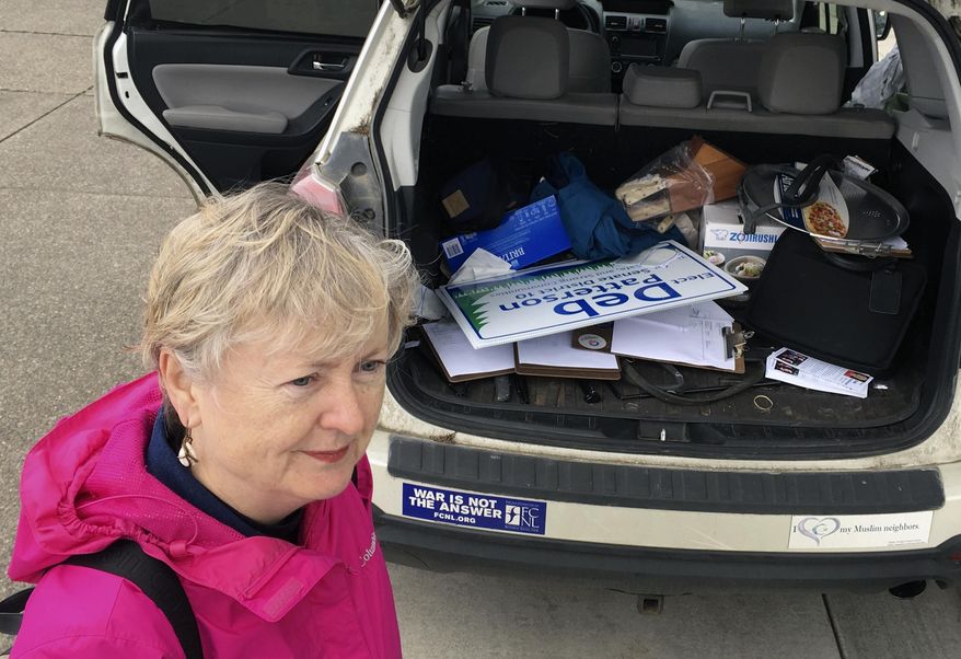 In this April 14, 2018, photo, Deb Patterson prepares to canvass in Independence, Ore.. hoping to win the Oregon May 15 primary and unseat four-term Republican Sen. Jackie Winters in November. A win could propel Democrats into a &amp;quot;supermajority&amp;quot; in the Oregon Legislature, with the ability to increase state revenue without Republican support. (AP Photo/Andrew Selsky)
