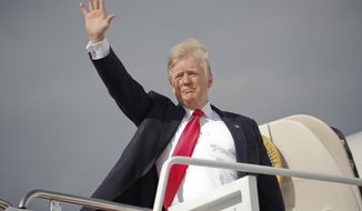 President Donald Trump waves as he boards Air Force One during his departure from Andrews Air Force One Base, Md., Saturday, April 28, 2018. Trump is traveling to Michigan to speak at a rally on the same night as the White House Correspondent&#39;s Dinner, the second straight year Trump as skipped the event with the White House Press Corps. (AP Photo/Pablo Martinez Monsivais)