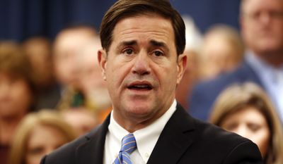 Arizona Gov. Doug Ducey speaks prior to signing the order calling the Legislature into a special session, Monday, Jan. 22, 2018, at the Capitol in Phoenix. The special session will enact a law in an effort to cut opioid overdose deaths. Ducey&#39;s proposal bars doctors from prescribing more than an initial five-day supply of pain medication, boosts pain clinic regulation and adds $10 million to help uninsured people get addiction treatment. (AP Photo/Matt York)