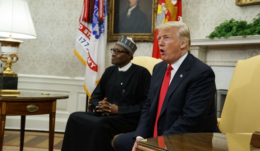 President Donald Trump meets with Nigerian President Muhammadu Buhari in the Oval Office of the White House, Monday, April 30, 2018, in Washington. (AP Photo/Evan Vucci)