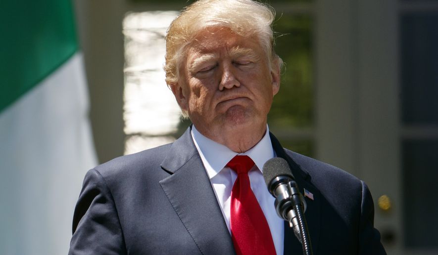 President Donald Trump pauses during a during a news conference with Nigerian President Muhammadu Buhari in the Rose Garden of the White House in Washington, Monday, April 30, 2018.(AP Photo/Carolyn Kaster)