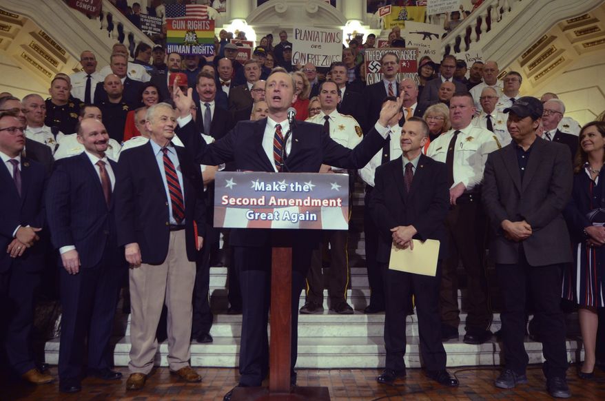 Pennsylvania state Rep. Jeff Pyle, R-Armstrong, speaks at an annual gun rights rally in the state Capitol Rotunda on Monday, April 30, 2018 in Harrisburg, Pa. A raucous rally drew hundreds of gun rights supporters to the Capitol on Monday, filling the Rotunda to the point where security had to turn people away. (AP Photo/Marc Levy)