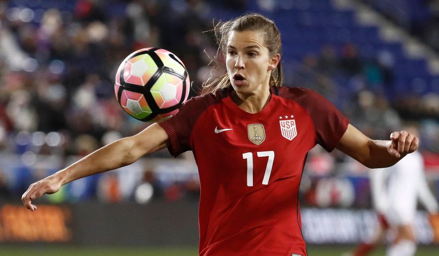 FILE - In this March 4, 2017, file photo, United States midfielder Tobin Heath (17) eyes the ball during the second half of a SheBelieves Cup women&#39;s soccer match against England, in Harrison, N.J. Heath, a U.S. national team veteran who is considered among the best players in the world, has returned to her NWSL club after spending the better part of the past year dealing with all-too-human injuries. Reflecting on the year, Heath was clearly frustrated during with her lengthy stay on the sideline.  (AP Photo/Julio Cortez, File)