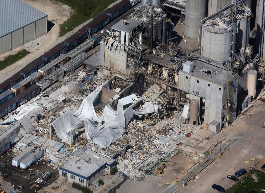 FILE - In this June 1, 2017 file photo, part of the Didion Milling Plant in Cambria, Wis., lies in ruins following an explosion. Federal safety inspectors say an air filter blew off a corn grinding device shortly before a deadly explosion demolished the southern Wisconsin corn mill last summer. Officials with the U.S. Chemical Safety and Hazard Investigation Board held a news conference Monday, April 30, 2018, to discuss preliminary findings from their investigation into the blast at Didion Milling Plant in Cambria on May 31. Five workers were killed and 14 were injured.(John Hart/Wisconsin State Journal via AP, File)