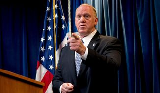 In this Dec. 5, 2017, file photo, then-acting Director for U.S. Immigration and Customs Enforcement Thomas Homan takes a question from a reporter at a Department of Homeland Security news conference in Washington. Homan, the acting director of the agency charged with combating illegal immigration, is stepping down, U.S. Immigration and Customs Enforcement announced Monday. (AP Photo/Andrew Harnik, File)