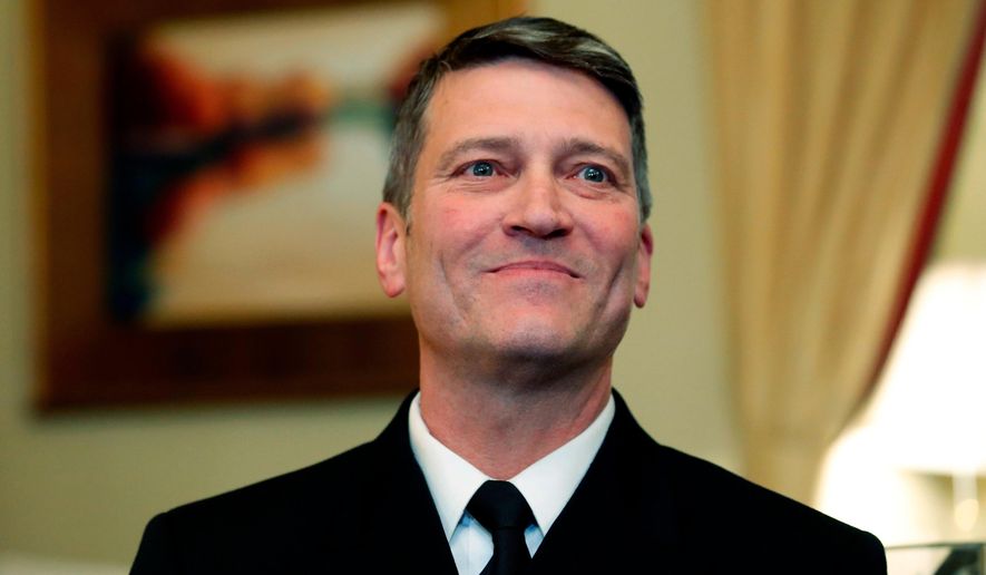 In this April 16, 2018, file photo, U.S. Navy Rear Adm. Ronny Jackson, M.D., sits before a meeting on Capitol Hill in Washington.  (AP Photo/Alex Brandon, File) **FILE**