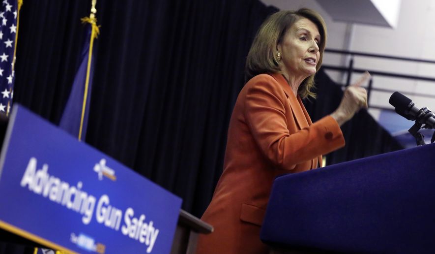 U.S. Rep. Nancy Pelosi, D-Calif., addresses the audience at John Jay College of Criminal Justice during a bill signing ceremony by New York Gov. Andrew Cuomo that removes guns from domestic abusers, Tuesday, May 1, 2018, in New York. (AP Photo/Richard Drew)