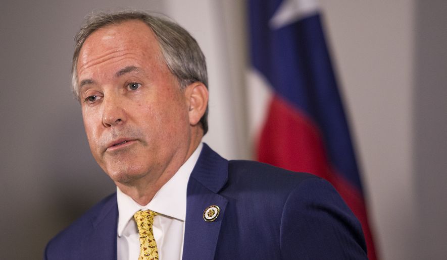 Texas Attorney General Ken Paxton speaks about a lawsuit he filed against the federal government to end DACA during a press conference in Austin, Texas, on May 1, 2018. Paxton is leading a seven-state coalition in the lawsuit. (Nick Wagner/Austin American-Statesman via AP) **FILE**
