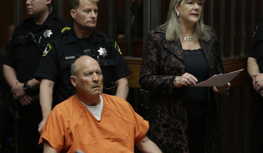 Sacramento Public Defender Diane Howard, right, representing Joseph James DeAngelo, who faces charges that include homicide and rape, responds to a judges' question in Sacramento County Superior Court, Friday, April 27, 2018, in Sacramento, Calif. DeAngelo 72, was arrested Tuesday on multiple charges in connection with a series of violent crimes throughout California in the 1970's and 1980's. DeAngelo was brought in to court in a wheelchair. (AP Photo/Rich Pedroncelli)