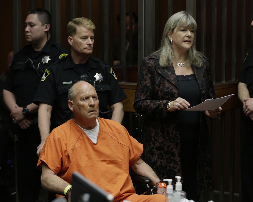 Sacramento Public Defender Diane Howard, right, representing Joseph James DeAngelo, who faces charges that include homicide and rape, responds to a judges' question in Sacramento County Superior Court, Friday, April 27, 2018, in Sacramento, Calif. DeAngelo 72, was arrested Tuesday on multiple charges in connection with a series of violent crimes throughout California in the 1970's and 1980's. DeAngelo was brought in to court in a wheelchair. (AP Photo/Rich Pedroncelli)