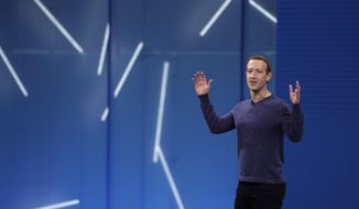 Facebook CEO Mark Zuckerberg makes the keynote address at F8, Facebook&#x27;s developer conference, Tuesday, May 1, 2018, in San Jose, Calif. (AP Photo/Marcio Jose Sanchez)