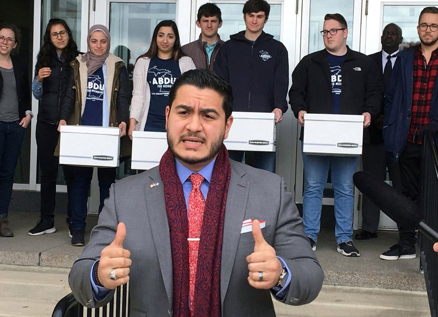 FILE - In this March 6, 2018, file photo, Democratic gubernatorial candidate Abdul El-Sayed speaks before submitting nominating petitions to the Michigan Bureau of Elections, in Lansing, Mich. El-Sayed launched his first TV ad in the Michigan governor's race Tuesday, May 1, 2018, touting his work to protect public health while calling for "new blood" in Lansing. (AP Photo/David Eggert File)