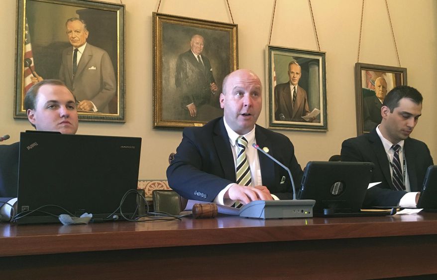 Illinois State Sen. Tom Cullerton, D-Villa Park, center, chairman of the Senate Veterans Affairs Committee, addresses a committee hearing Tuesday, May 1, 2018, at the Illinois state Capitol in Springfield, Ill. Cullerton says he has legislation ready to be filed to authorize spending for new construction at the Quincy veterans home to modernize its plumbing and eliminate the risk of Legionnaires' disease, which has lead to the deaths of 13 residents there since 2015. Cullerton is waiting for a report from Gov. Bruce Rauner's administration set for delivery Tuesday afternoon. A preliminary report in April put total improvement costs at $278 million. (AP Photo/John O'Connor)
