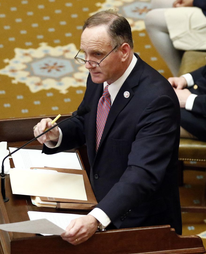 FILE - In this Jan. 31, 2018 file photo, Judiciary A Committee Chairman Mark Baker, R-Brandon, explains a facet of a proposed bill, before lawmakers during floor action in House chambers at the Capitol in Jackson, Miss. Baker announced his plans to run for attorney general, Tuesday, May 1, 2018, becoming the first candidate in what could be an open race for attorney general, as the four-term incumbent, Democrat Jim Hood, is widely expected to run for governor in 2019. Hood is the only Democrat in statewide office. (AP Photo/Rogelio V. Solis, File)