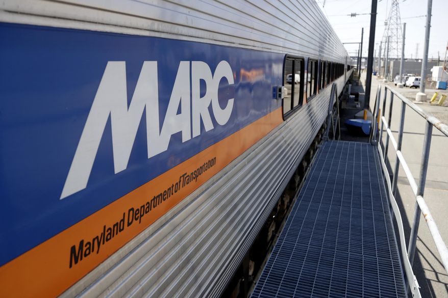 A Maryland Transit Administration's MARC commuter train wagon sits on an inspection track at New Jersey Transit's Meadows Maintenance Complex, Tuesday, May 1, 2018, in Kearny, N.J. (AP Photo/Julio Cortez) ** FILE **