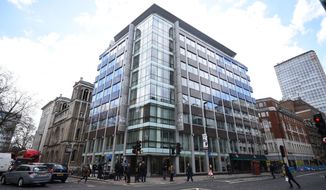 This March 20, 2018, file photo shows the offices of Cambridge Analytica in central London. A published report says the data firm at the center of Facebook’s privacy debacle is closing its doors. Cambridge Analytica has been linked to Donald Trump’s 2016 presidential campaign. The British firm suspended its CEO Alexander Tayler in April amid investigations. The Wall Street Journal says the shutdown on Wednesday, May 2, comes as the firm is losing clients and facing legal fees from the Facebook case. (Kirsty O&#x27;Connor/PA via AP, file)