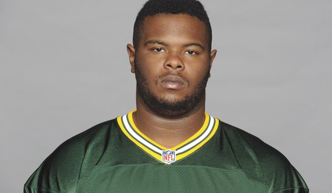 FILE - This is a 2014 file photo showing former Green Bay Packers NFL football player Carlos Gray. Authorities say a former Green Bay Packers player has been found shot to death in his home in Alabama. The Jefferson County Coroner&#x27;s Office says former Packers defensive lineman Carlos Gray was found shortly before 10 p.m. Monday, April 30, 2018, near Birmingham, Alabama. The 25-year-old is a native of Pinson, Alabama. (AP Photo/File)