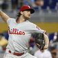 Philadelphia Phillies&#39; Aaron Nola delivers a pitch during the first inning of the team&#39;s baseball game against the Miami Marlins, Wednesday, May 2, 2018, in Miami. (AP Photo/Wilfredo Lee)