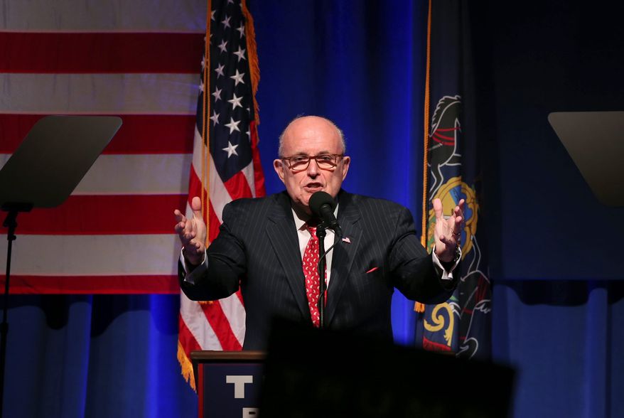 Former New York City Mayor Rudy Giuliani addresses a gathering at a campaign rally for Republican presidential candidate Donald Trump Monday, Nov. 7, 2016, in Scranton, Pa. (AP Photo/Mel Evans) **FILE**