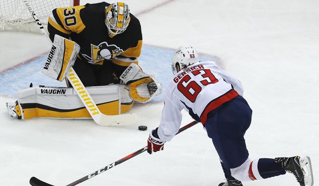 Pittsburgh Penguins goaltender Matt Murray (30) stops Washington Capitals&#x27; Shane Gersich (63) on a breakaway during the first period in Game 4 of an NHL second-round hockey playoff series in Pittsburgh, Thursday, May 3, 2018. (AP Photo/Gene J. Puskar) ** FILE **