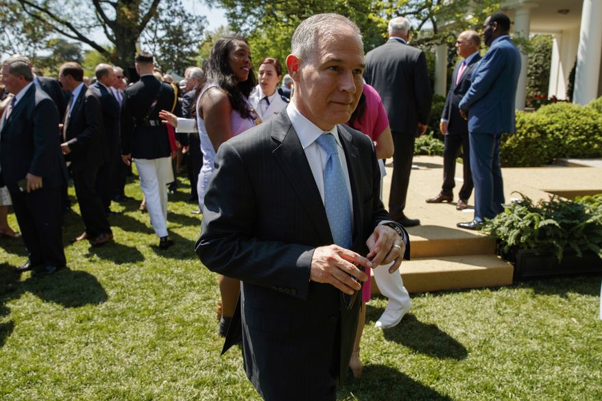 Environmental Protection Agency administrator Scott Pruitt leaves a "National Day of Prayer" event in the Rose Garden of the White House, Thursday, May 3, 2018, in Washington. (AP Photo/Evan Vucci) ** FILE **