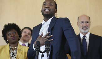 Rapper Meek Mill speaks during a news conference promoting Gov. Tom Wolf&#39;s proposals to reform the criminal justice system at the National Constitution Center in Philadelphia on Thursday, May 3, 2018. Wolf, Mill and several state legislators spoke in favor of reforms. (Tim Tai/The Philadelphia Inquirer via AP)