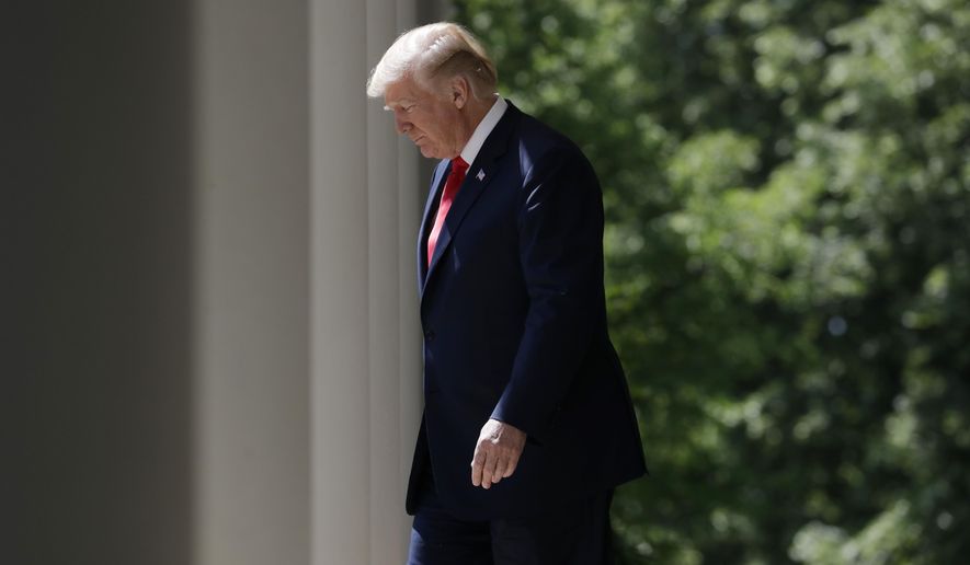President Donald Trump walks out to speak during a "National Day of Prayer" event in the Rose Garden of the White House, Thursday, May 3, 2018, in Washington. (AP Photo/Evan Vucci)