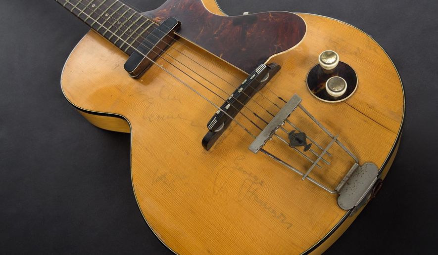 This image provided by Julien&#39;s Auctions shows George Harrison’s first electric guitar. The auction house estimates the guitar will sell for between $200,000 and $300,000. (Julien&#39;s Auctions via AP)
