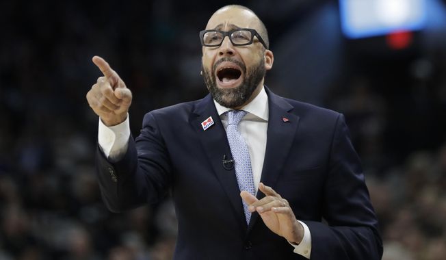 FILE - In this April 25, 2017, file photo, Memphis Grizzlies head coach David Fizdale directs his players during the first half of Game 5 in a first-round NBA basketball playoff series against the San Antonio Spurs in San Antonio. A person with knowledge of the details said Thursday, May 3, 2018, that the New York Knicks have agreed to hire Fizdale as their new coach. The former Grizzlies coach will replace Jeff Hornacek, who was fired last month after two seasons. (AP Photo/Eric Gay, File)