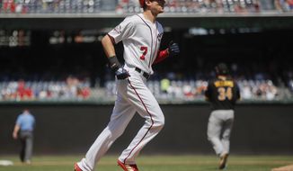Washington Nationals&#39; Trea Turner (7) circles the bases after hitting a two-run homer off Pittsburgh Pirates starting pitcher Trevor Williams (34), during the sixth inning of a baseball game at Nationals Park, Thursday, May 3, 2018, in Washington. (AP Photo/Pablo Martinez Monsivais)