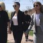Actress Rose McGowan, flanked by lawyers Jennifer Robinson, left, and Jessica Carmichael, right, outside the Loudoun County courthouse Thursday, May 3, 2018, in Leesburg, Va. A judge is scheduled to hear evidence on whether a drug possession charge in Virginia against McGowan should go forward. (AP Photo/Matthew Barakat)