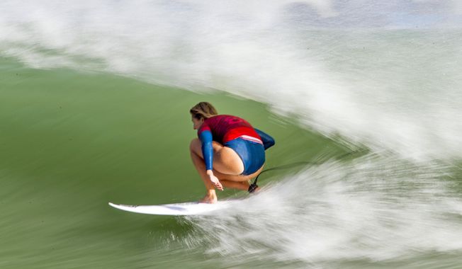 In this September 2017 photo provided by World Surf League, Future Classic runner-up and six-time World Champion Stephanie Gilmore, of Australia, rides a wave at the Future Classic surfing meet in Lemoore Calif. Surfing star Kelly Slater has not only found what could be the perfect wave, but he&#x27;s created it. Slater will introduce his Surf Ranch in Lemoore to the world this weekend, when the two-day Founders&#x27; Cup of Surfing is held on May 5 and 6, 2018, in a nondescript corner of California&#x27;s Central Valley, some 100 miles from the Pacific Ocean. (Kenneth Morris/World Surf League via AP)