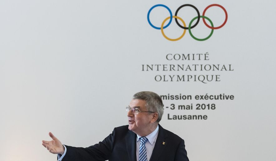 International Olympic Committee, IOC, President Thomas Bach from Germany, reacts prior to the opening of the International Olympic Committee, IOC, executive board meeting, in Lausanne, Switzerland, Wednesday, May 2, 2018. (Jean-Christophe Bott/KEYSTONE via AP)