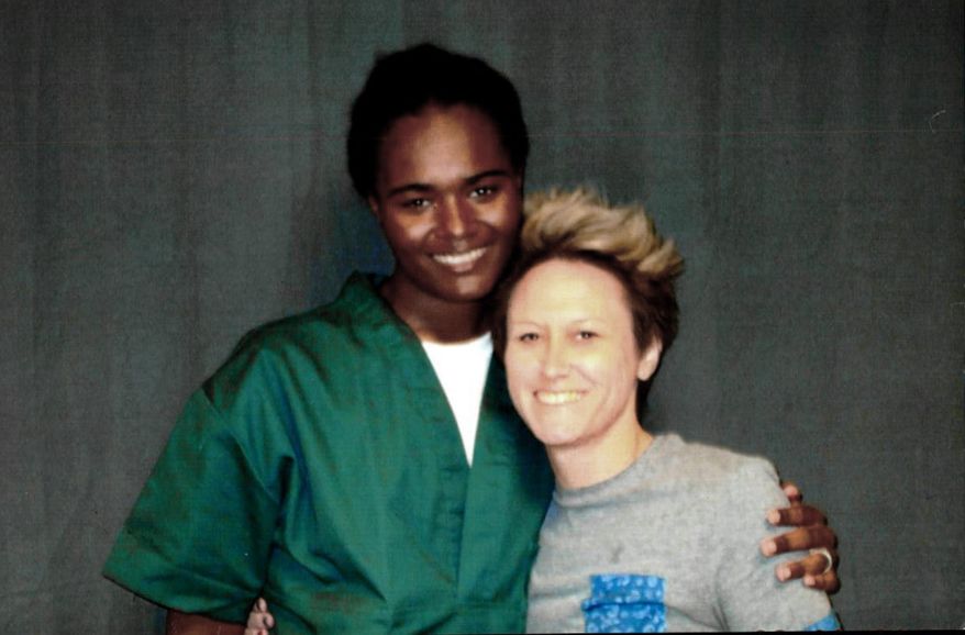This 2018 photo provided by inmate Lindsay Saunders-Velez shows her, at left, with mentor Meghan Baker at the Colorado Territorial Correctional Facility in Cañon City, Colo. Saunders-Velez is a transgender inmate who is suing Colorado's corrections agency, saying she was raped at a men's prison hours after a federal judge denied her request to block the prison from keeping her in a disciplinary unit. (Courtesy Lindsay Saunders-Velez via AP)