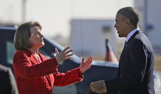 In this Nov. 25, 2013, file photo, then-President Barack Obama and Sen. Dianne Feinstein, D-Calif., greet each other on the tarmac upon his arrival on Air Force One at San Francisco International Airport. (AP Photo/Pablo Martinez Monsivais, File)