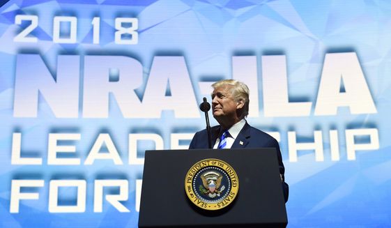 President Donald Trump speaks at the National Rifle Association&#39;s annual convention in Dallas, Friday, May 4, 2018. (AP Photo/Susan Walsh)